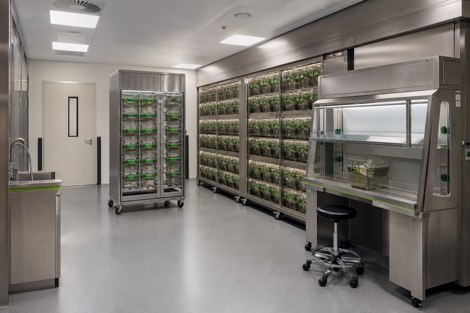 IVC cage racks and an animal transfer station arranged for housing and containment workflow planning